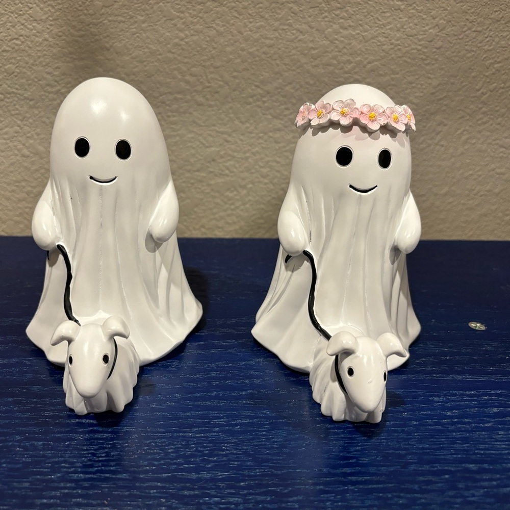 Set of ghosts walking dogs. Boy and girl with flower crown